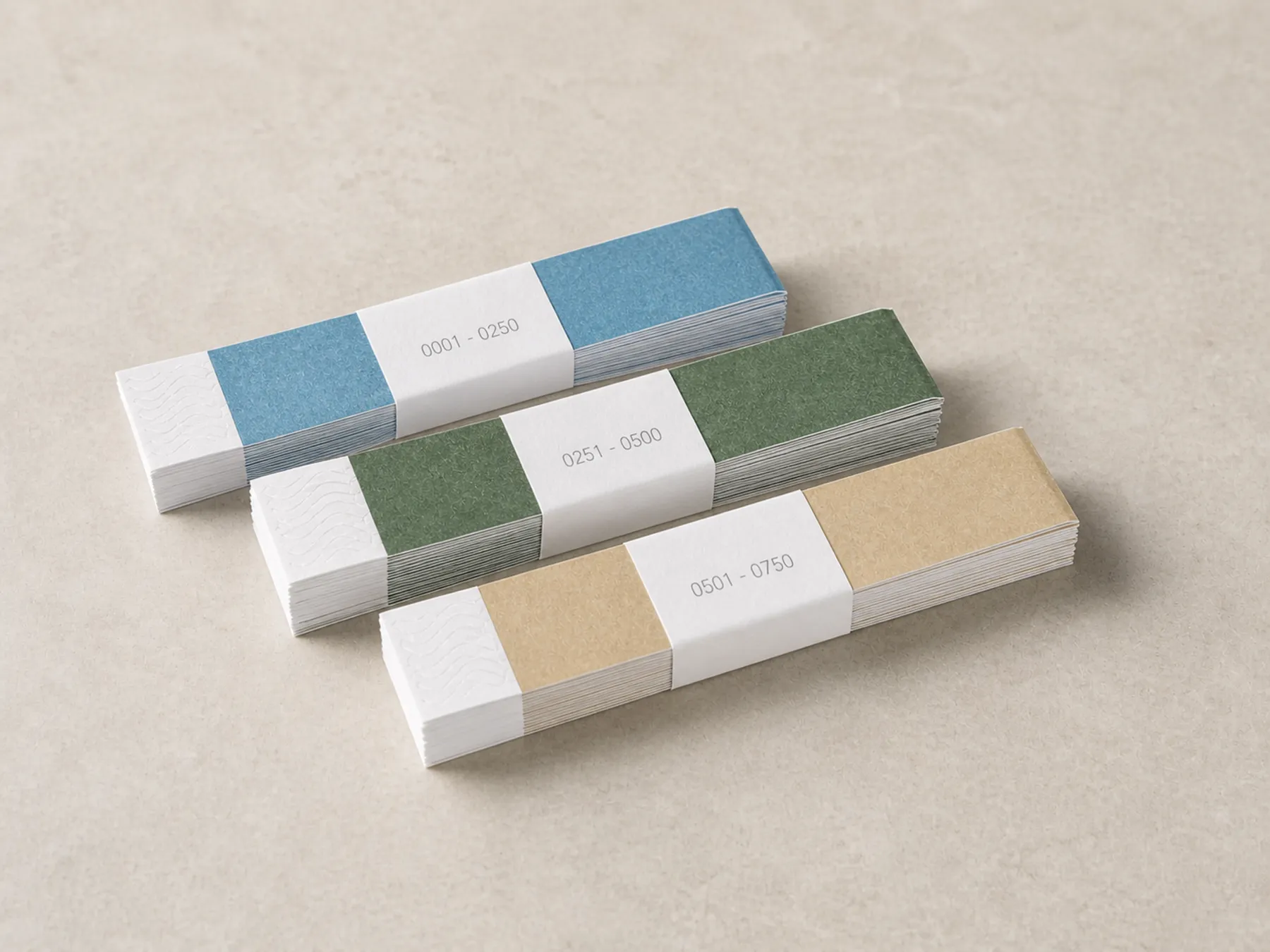 Counted stacks of colour-coded paper resort wristbands